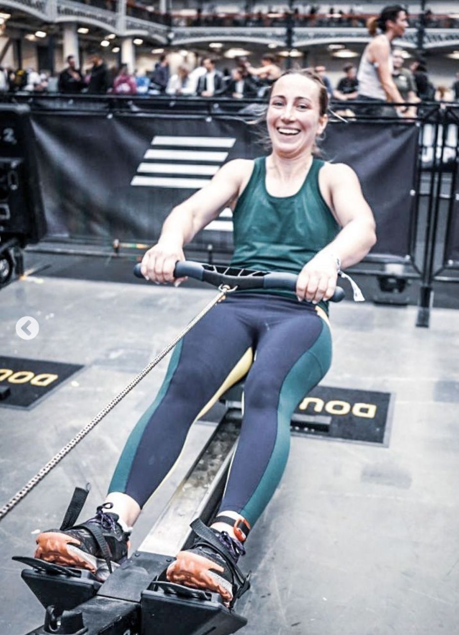 woman on rowing machine at Hyrox