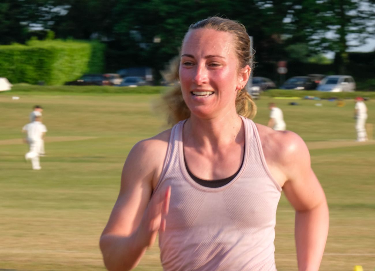 happy woman running at bootcamp